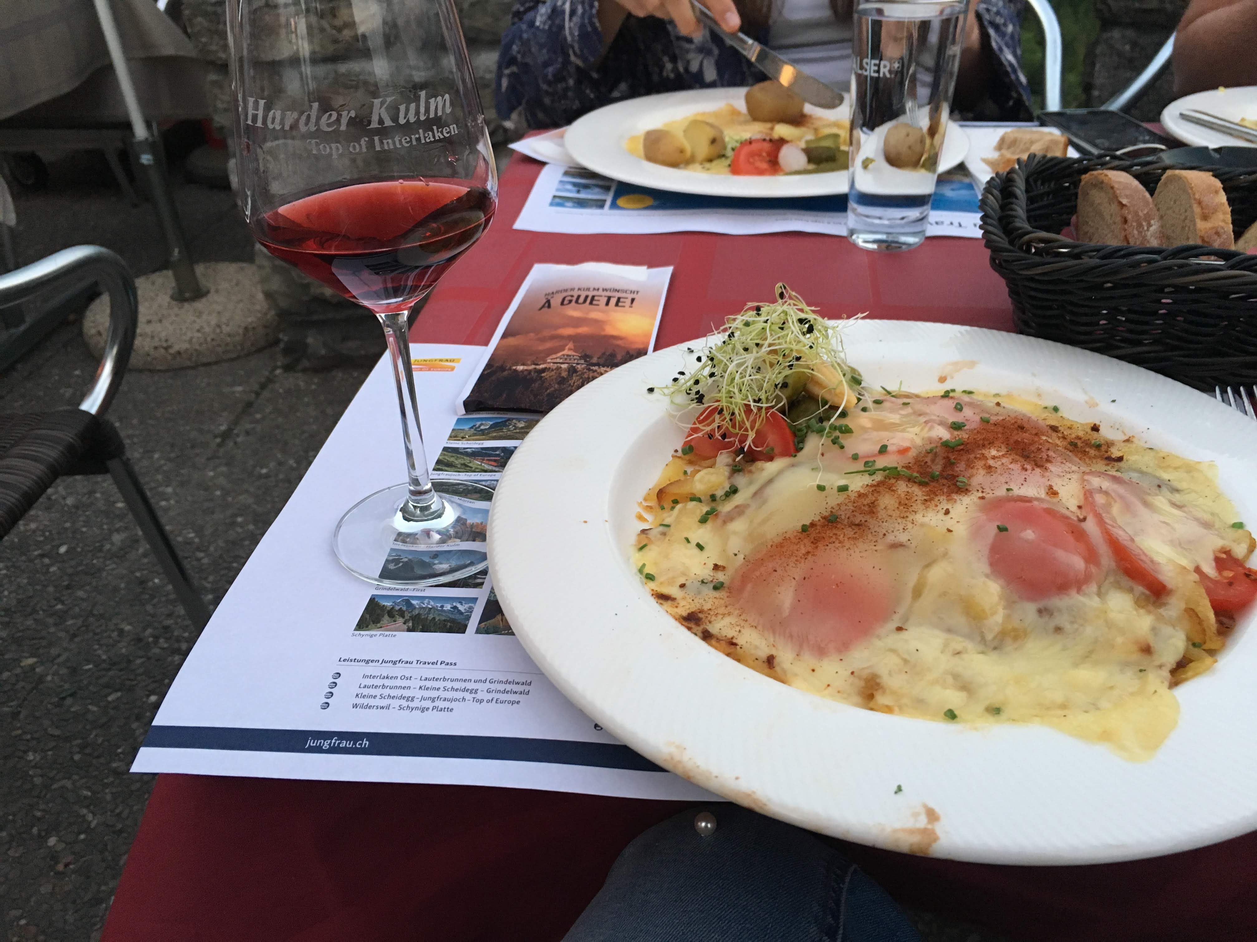 Interlaken travel - swiss cheese patato dish - travel addict hack